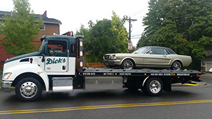 Dick's Towing Inc flatbed tow truck